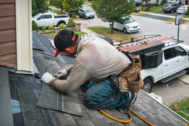 Professional Roofing technician working in Breckenridge, MI